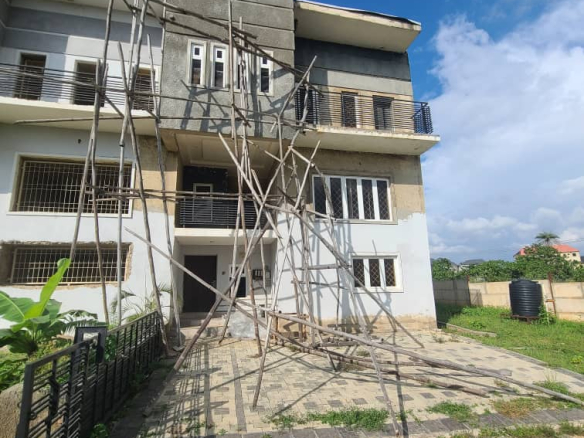 Front view of a spacious 5-bedroom terrace triplex in Karsana, Abuja