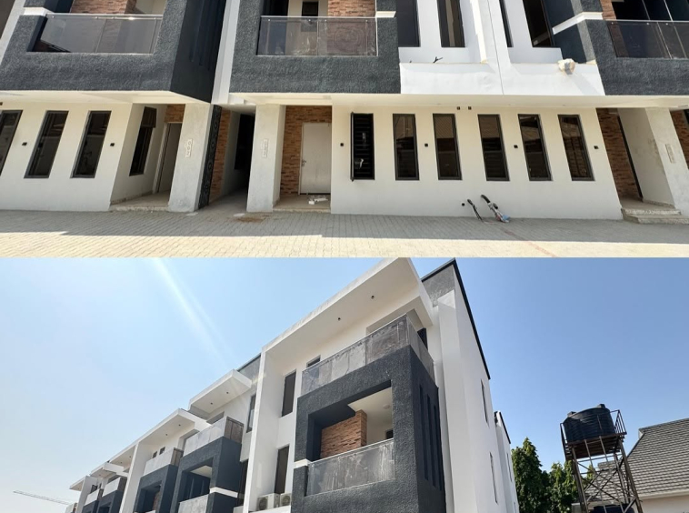 Modern 4-bedroom terrace duplex exterior in Wuse2 Abuja, showcasing sleek architecture and landscaped frontage