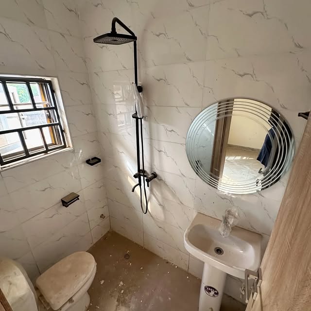 Brand-New 3-Bedroom Terraced Duplex with BQ in a Serene Life Camp Estate bathroom