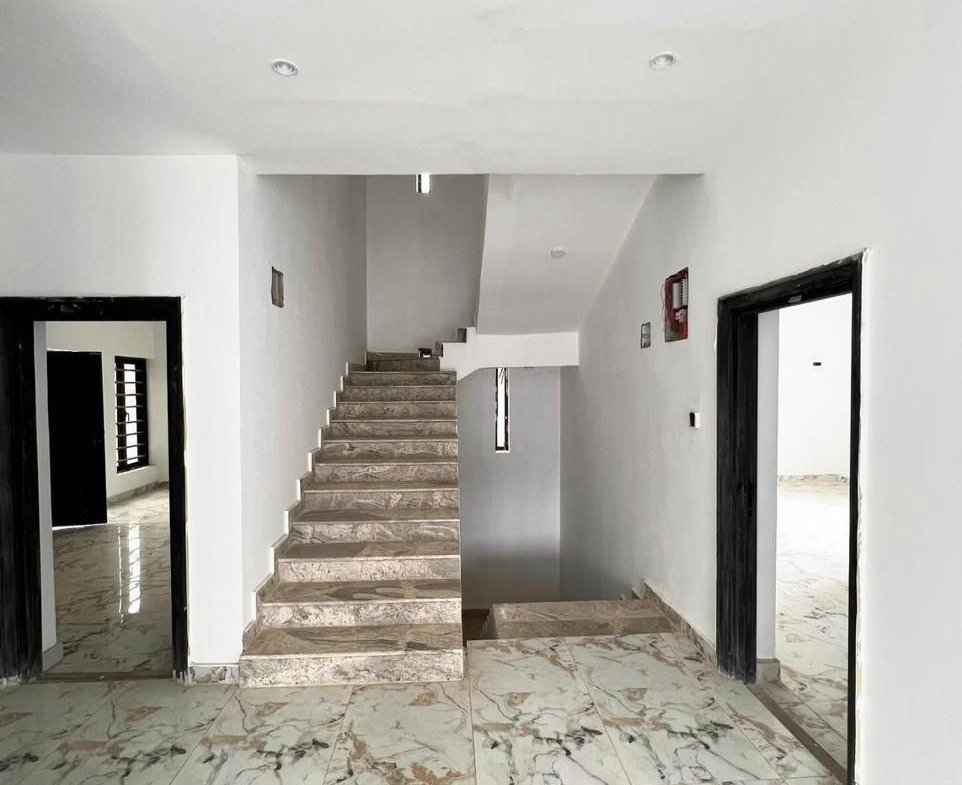 The staircase of 6-Bedroom Duplex for Sale Near COZA