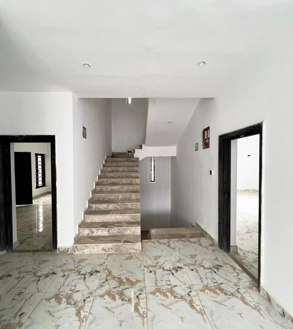 The staircase of 6-Bedroom Duplex for Sale Near COZA