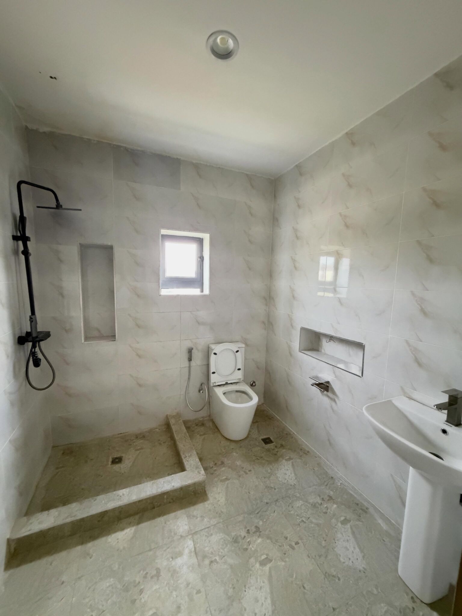 two units of 4-bedroom terrace duplexes and two units of 2-bedroom flats