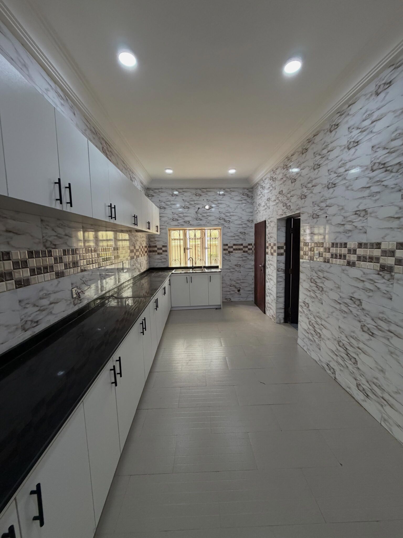 7-bedroom terrace duplex with a 1-room Boys' Quarters (BQ)