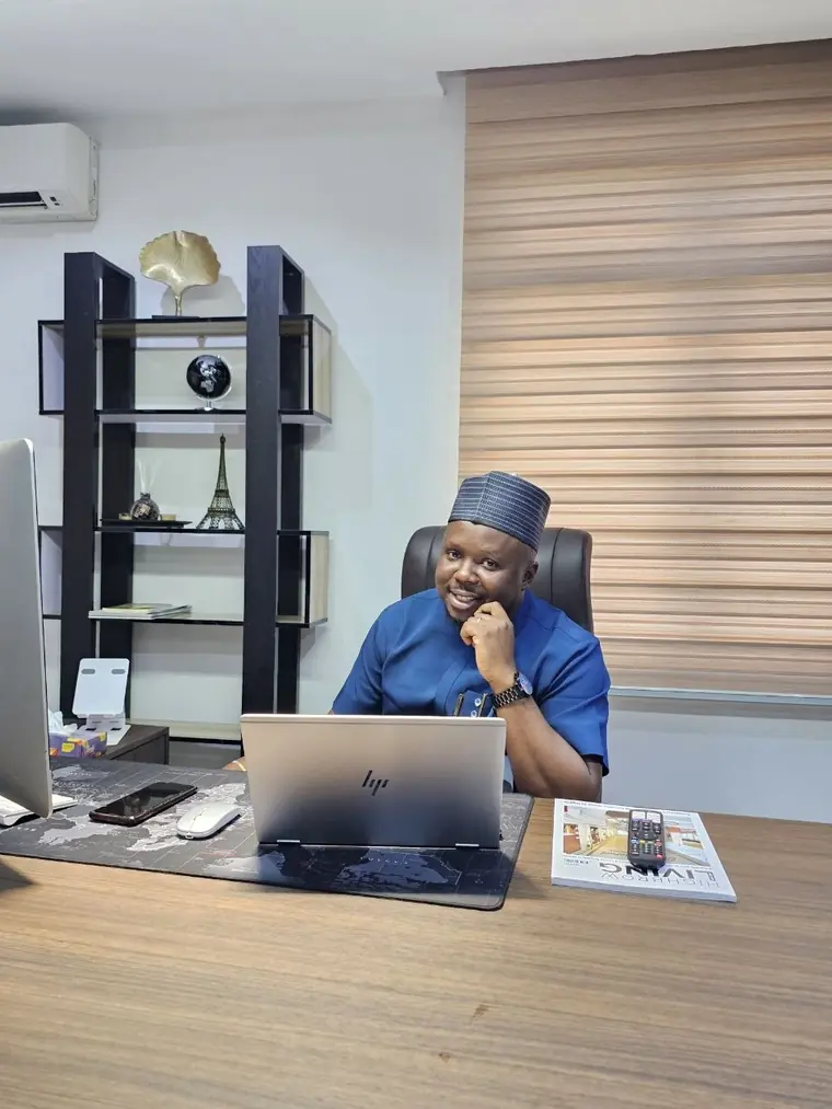 A.I Realent founder at the Abuja real estate office